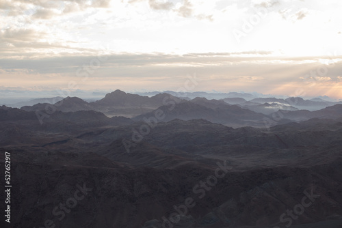 Amazing Sunrise at Sinai Mountain, Mount Moses with a Bedouin, Beautiful view from the mountain © adydyka2780