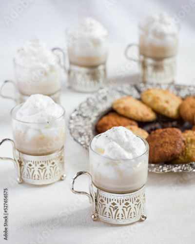 Cocoa with whipped cream and cookies on Christmas morning