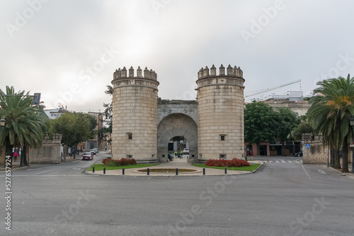 View at the iconic Palmas Gate ou New Gate, called Puerta Palmas or Puerta Nueva, an triumphal arch military monument in honor to Carlos V, in Badajoz downtown, Spain