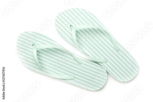 Green flip flops isolated on white background, top view