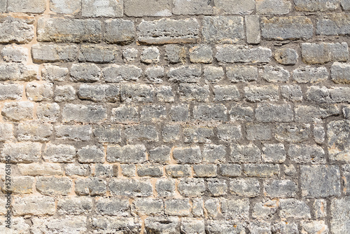 Architecture textures  detailed view of a traditional paired masonry  granite wall  used on a fortress castle wall