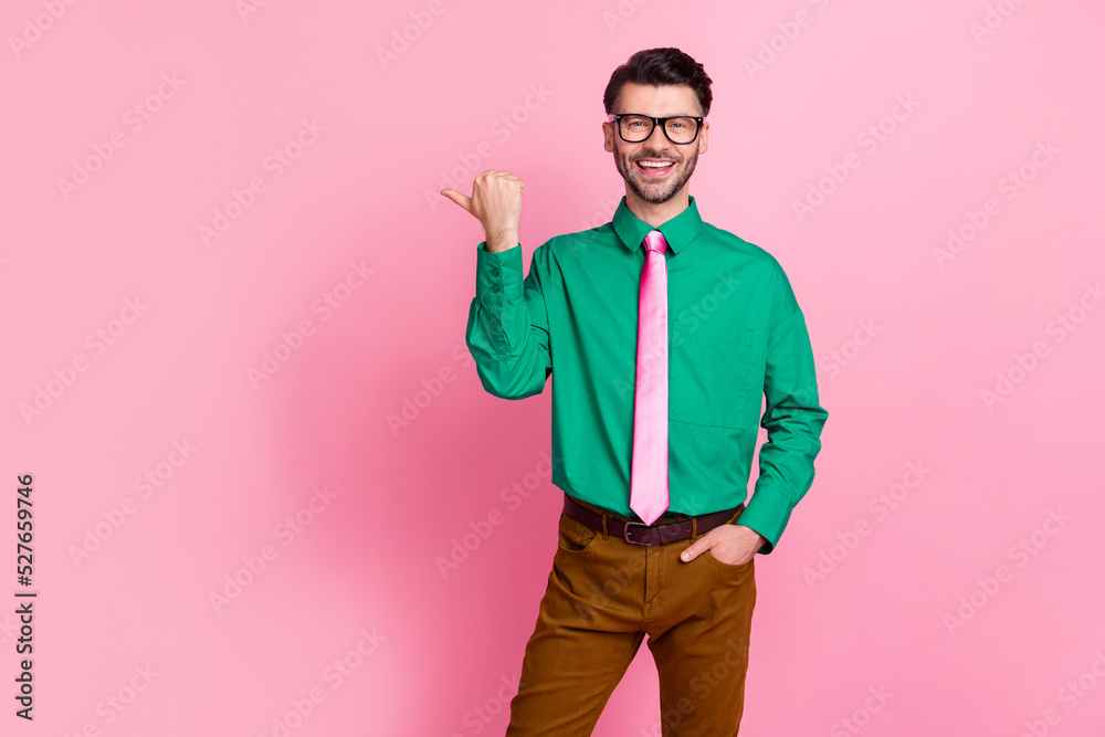 Photo of good looking man bachelor wear elegant outfit hand arm promote offer new trendy store isolated on pink color background