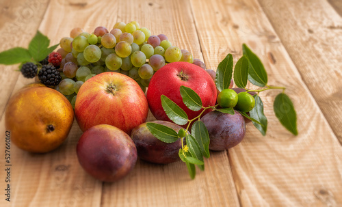 Autumn real bio fresh fruit on a wooden table