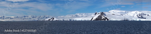Panorama of snow covered mountains at Portal Point in Antarctica © Angela