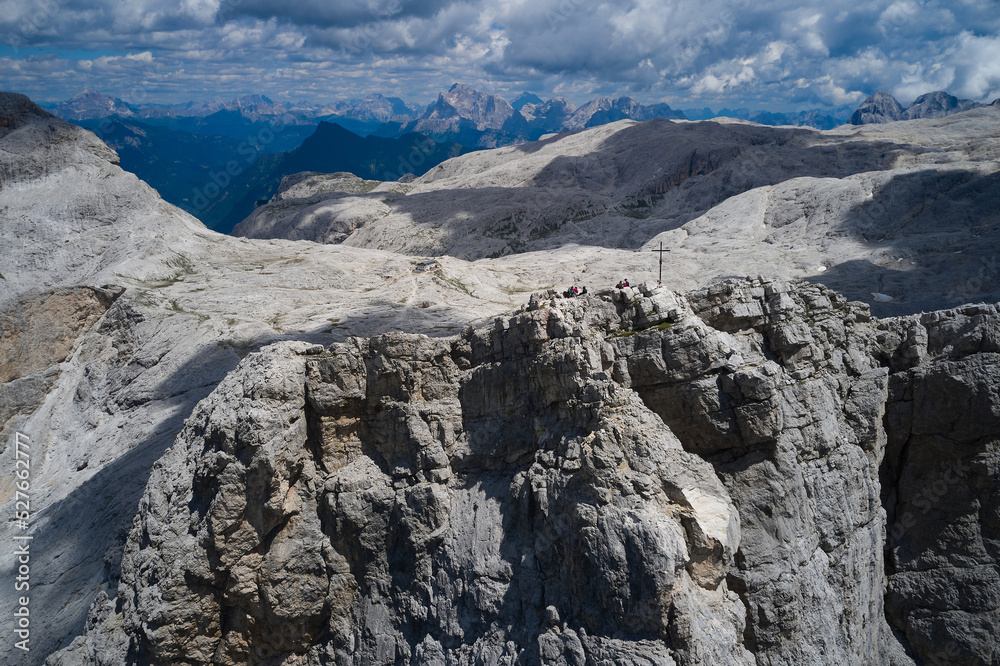 aerial view of the cross and the Rosetta refuge in the Trentino Dolomites