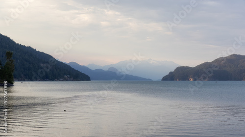 Harrison Lake with Canadian Mountain Landscape. Sunny Summer Sunset Sky. Harrison Hot Springs  British Columbia  Canada. Nature Background.