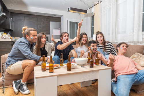 Group of friends watching a soccer match