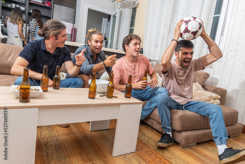 Group of friends watching a soccer game