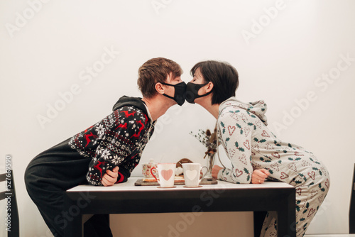 Girl and Guy Kissing in Masks on Quarantine COVID-19