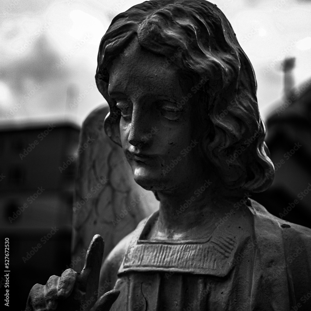 Gothic statue of an angel. Black and white photo