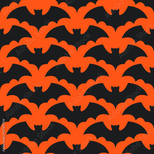 Seamless pattern with bats on orange background.