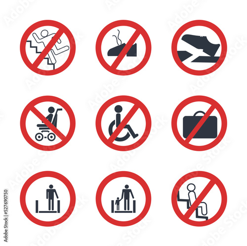Set of accident prevention signs on escalators.
