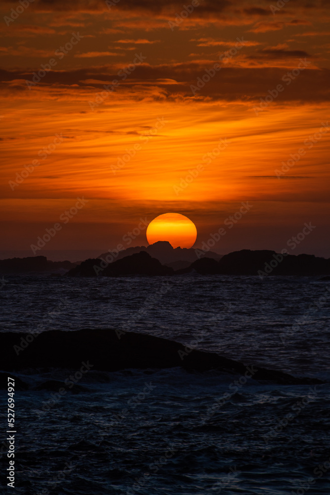 firey sunset over the water 