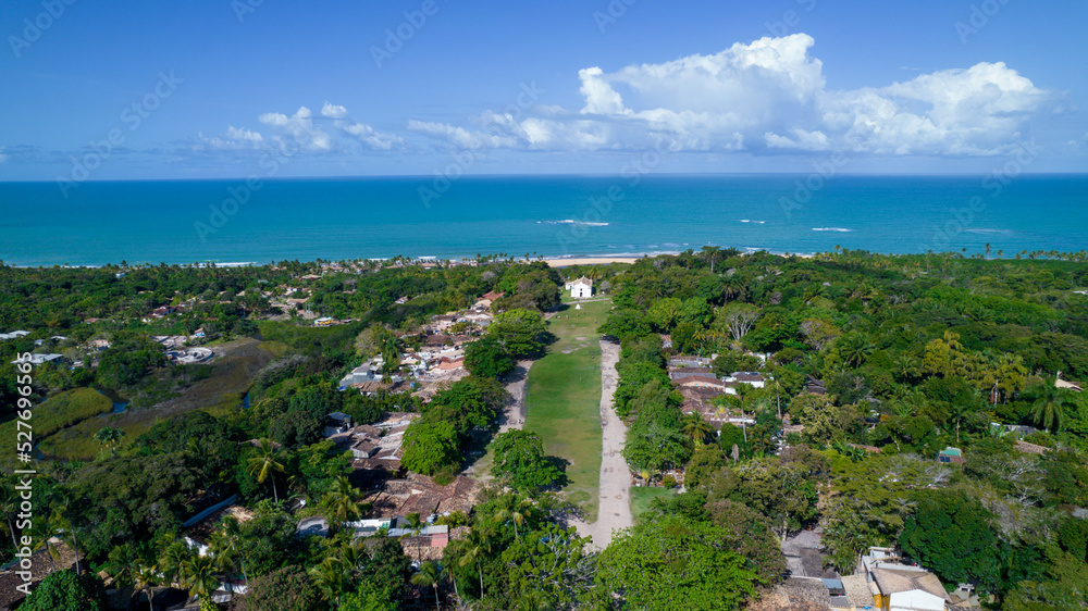 Obraz premium Aerial view of Trancoso, Porto Seguro, Bahia, Brazil. Small chapel in the historic center of Trancoso, called Quadrado. With the sea in the background