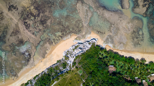 Aerial view of Praia do Espelho  Porto Seguro  Bahia  Brazil. Natural pools in the sea  cliffs and greenish water
