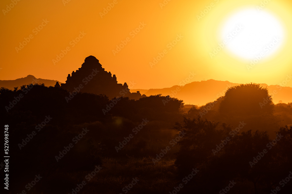 The sunset silhouette behind a mighty temple in the World Heritage Site of Bagan in Myanmar The sunset silhouette behind a mighty temple in the World Heritage Site of Bagan in Myanmar