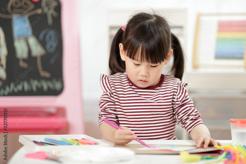 young girl painting hand made craft at home young girl painting hand made craft at home