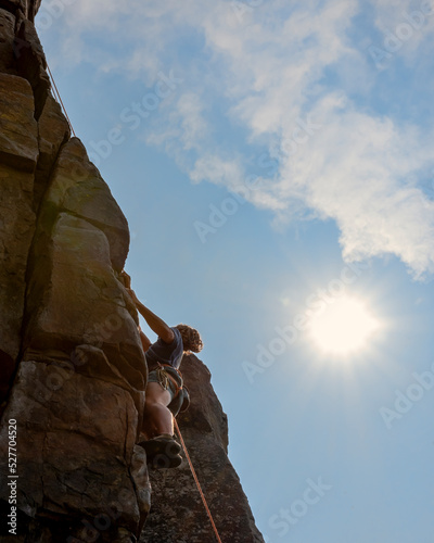 climber on a rock photo