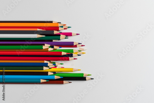 bunch of colored pencils flat lay view from above