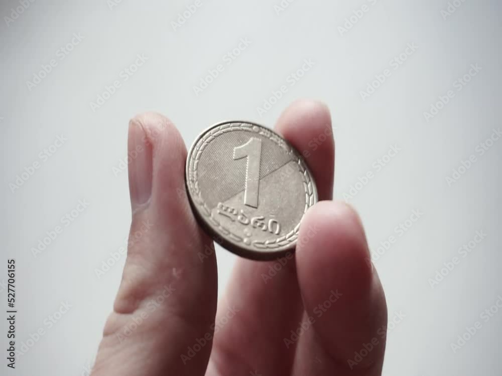 One Georgian lari in the form of a coin One Georgian lari in the form of a coin