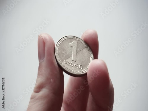 One Georgian lari in the form of a coin