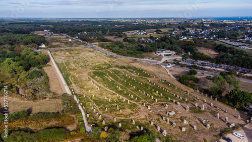 Aerial view of the Carnac stone alignments of Ménec in Morbihan, France - Prehistoric menhirs and megaliths in rows in Brittany photo