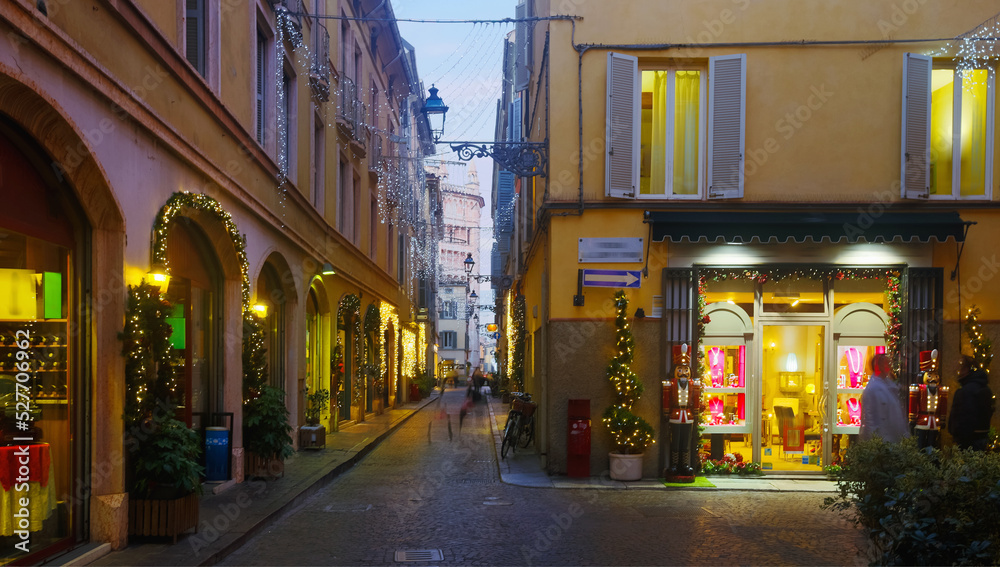 Night Christmas illumination of Parma in Italy outdoor.