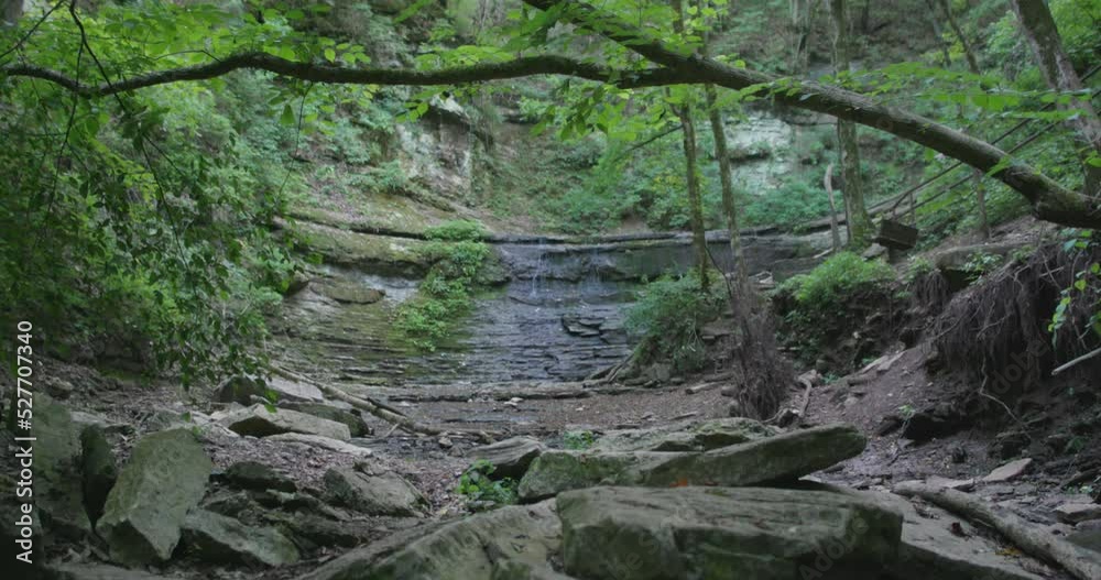 Water trickles from rocks of waterfall Water trickles from rocks of waterfall