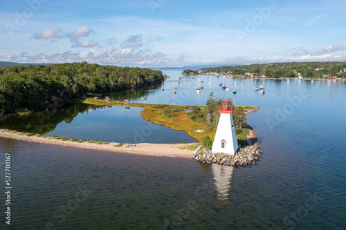 Fotobehang Aerial view of the lighthouse on Bras D'Or lake near Baddeck, Nova Scotia Canada
