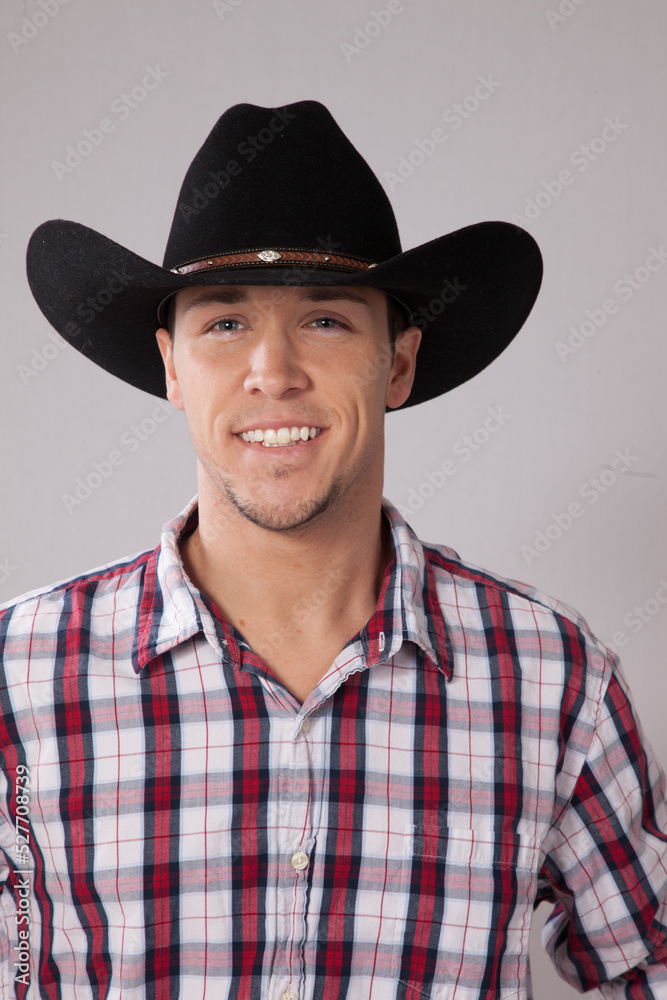 Handsome cowboy with a pleasing smile Handsome cowboy with a pleasing smile