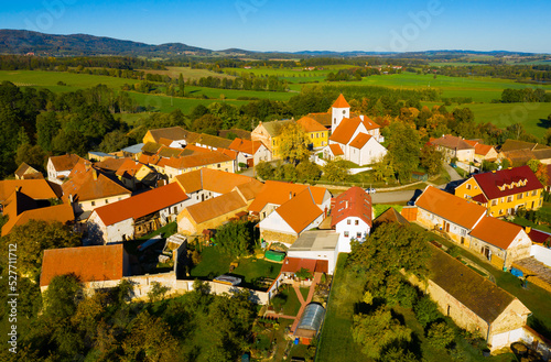 Scenic aerial view of typical Czech village of Cakov in autumn, Ceske Budejovice district..