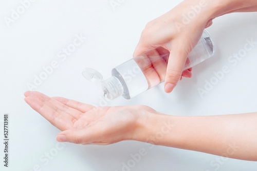 hands holding skin lotion