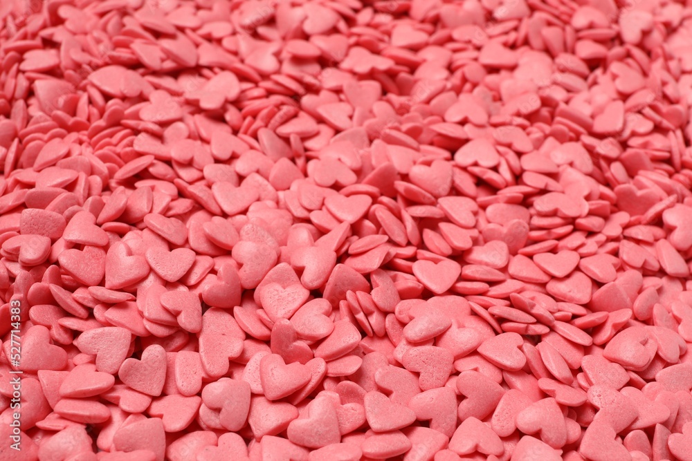 Sweet candy hearts as background, closeup view Sweet candy hearts as background, closeup view
