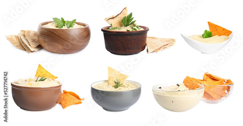 Set with delicious hummus with pita chips on white background