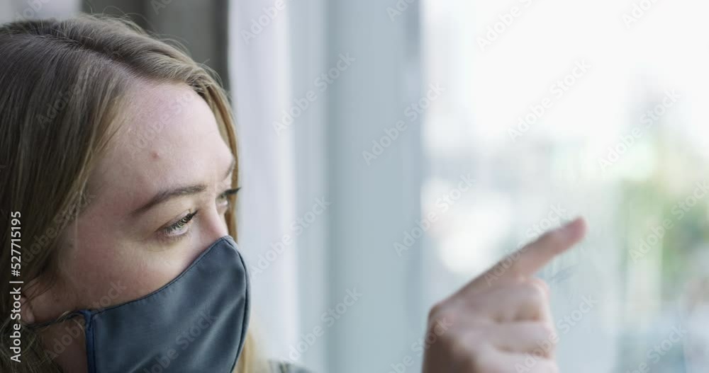 Covid woman, self isolation and quarantine home for health safety, risk and corona virus pandemic. Lonely, bored and sad depression lady drawing with fog steam, cold winter and breath on glass window