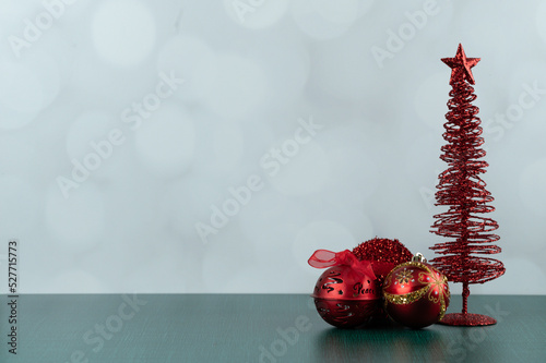 Red Christmas tree with red Ornaments on white background