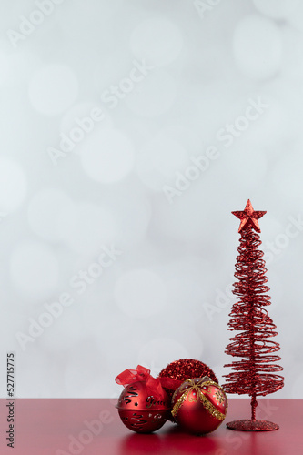 Red Christmas tree with red Ornaments on white background