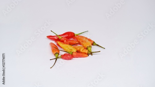Cabe rawit merah. Red cayenne pepper isolated on white background photo