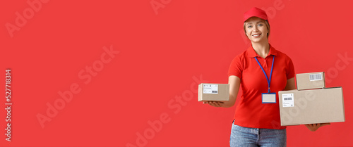 Female courier with parcels...