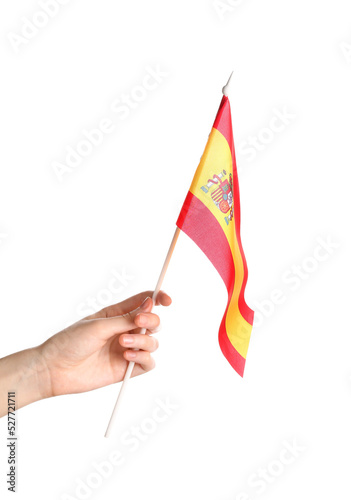 Female hand with flag of Spain on white background