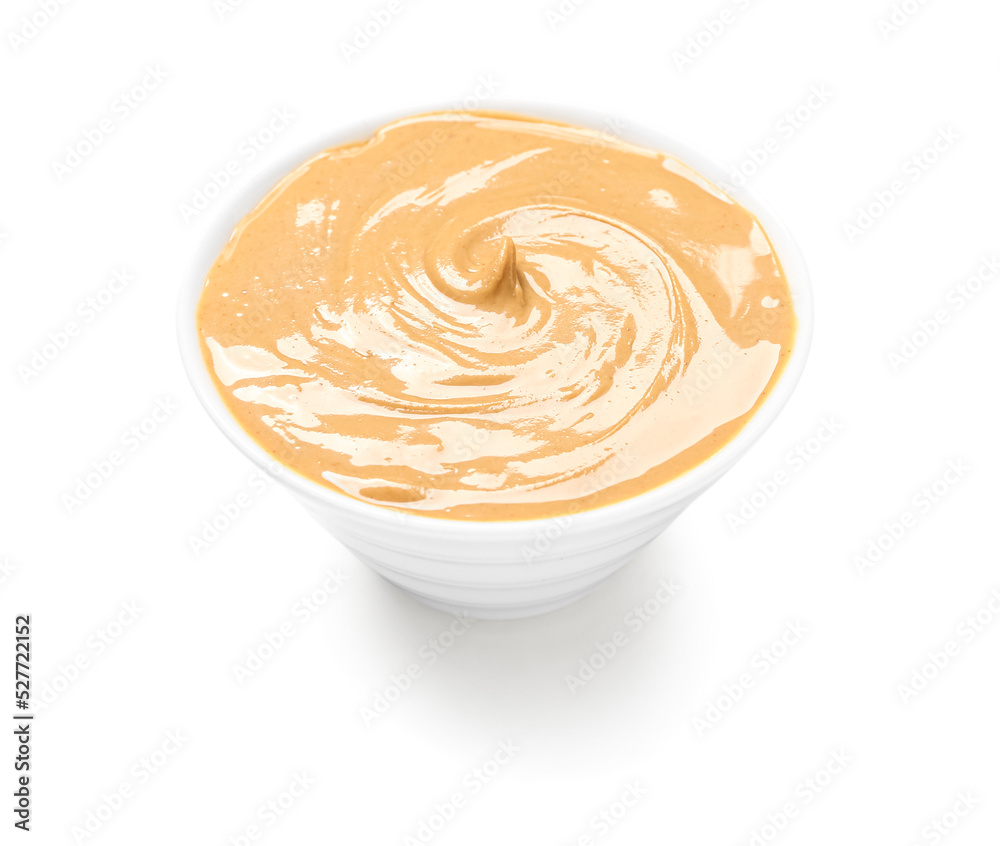 Bowl of tasty nut butter on white background Bowl of tasty nut butter on white background