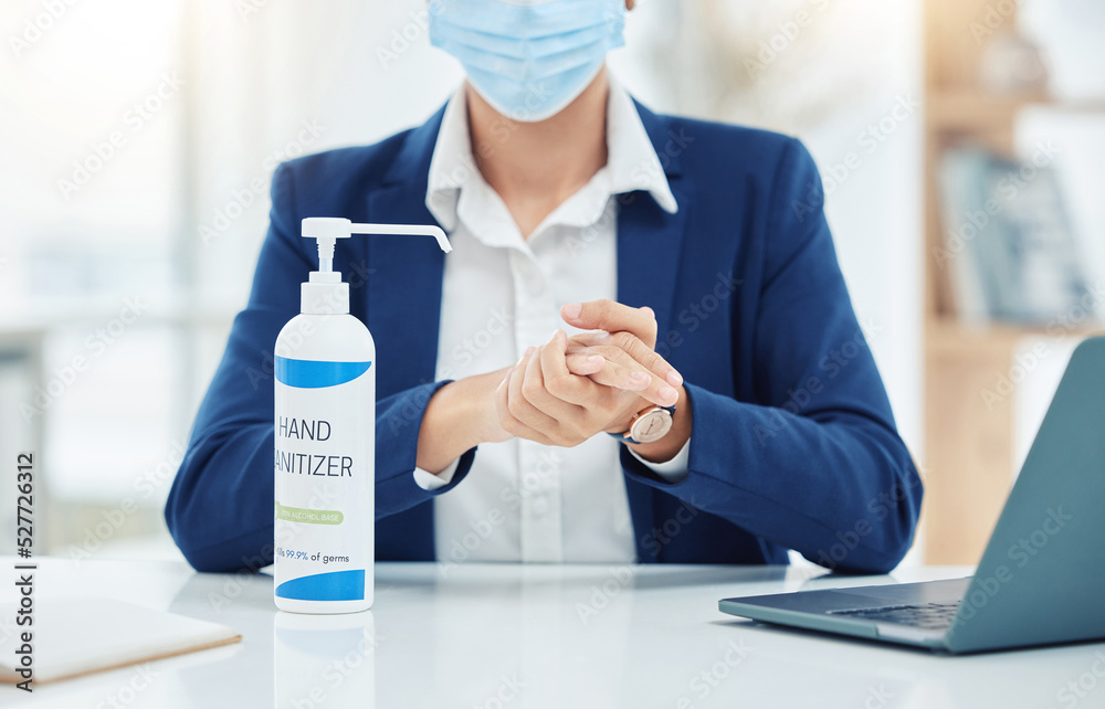 Cleaning, compliance and covid rules at work by business woman sanitize hands while working on laptop. Professional female worker clean hand before going online for design or marketing strategy Cleaning, compliance and covid rules at work by business woman sanitize hands while working on laptop. Professional female worker clean hand before going online for design or marketing strategy