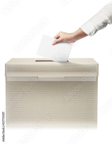 Close-up hand holding ballot paper into the voting box. Freedom democracy concept. Freedom vote concept.