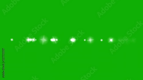 Twinkling sparks line motion graphics with green screen background photo