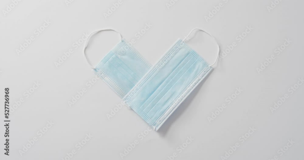 Heart shape face masks on white background at valentine's day Heart shape face masks on white background at valentine's day