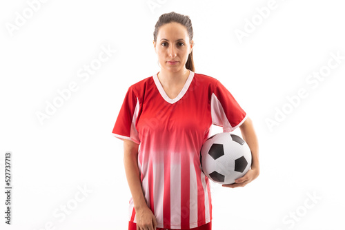 Portrait of confident caucasian young female player with soccer ball against white background