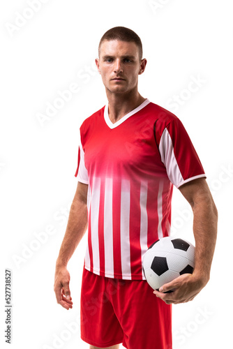 Portrait of confident young male caucasian athlete holding soccer ball against white background