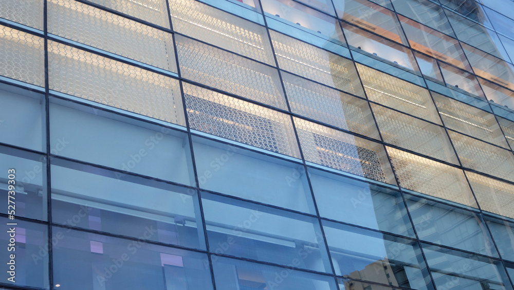 Close-Up modern shopping building.building with copy space.windows office building for background Close-Up modern shopping building.building with copy space.windows office building for background