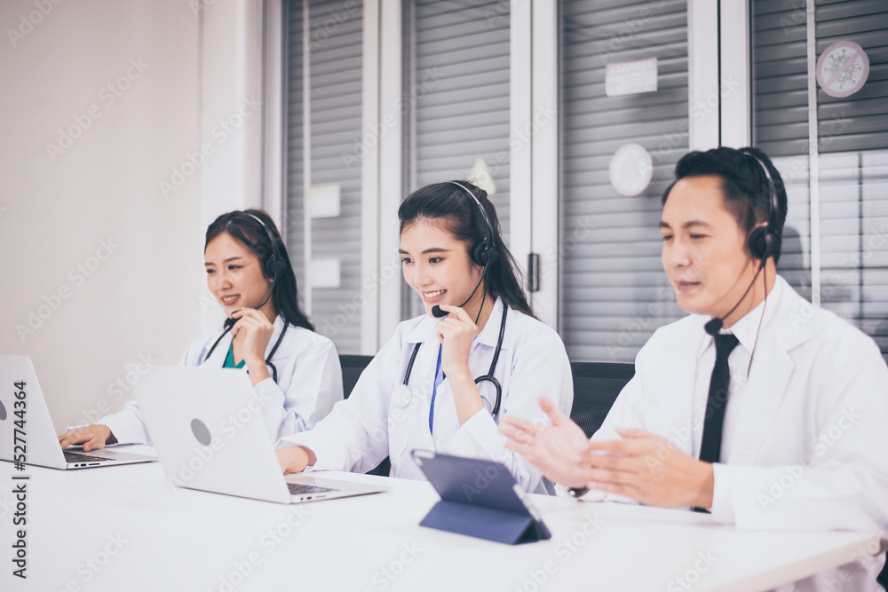 Asian medical call center team working together at hospital,International medical service center Asian medical call center team working together at hospital,International medical service center