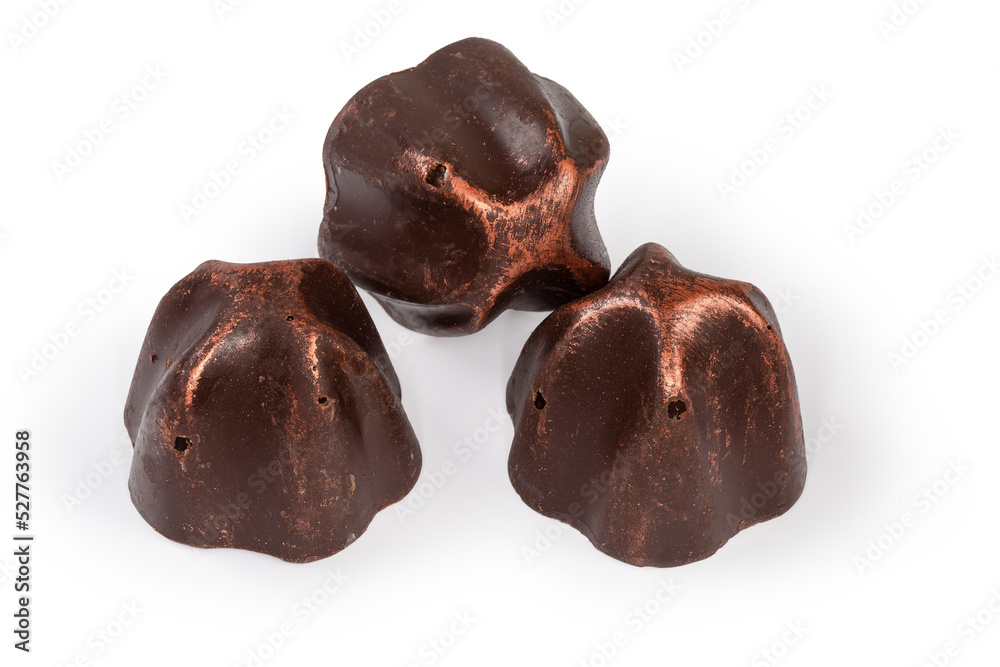 Chocolate truffles on a white background close-up Chocolate truffles on a white background close-up